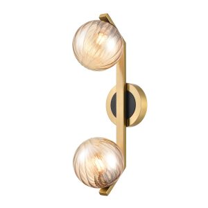 Franklite Oculus double bathroom wall light in aged brass and matt black with amber ribbed glass spheres, shown vertical.