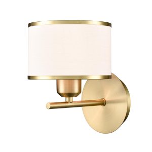 Franklite Polaris single aged brass wall light with off-white textured fabric shade, on white background, lit.