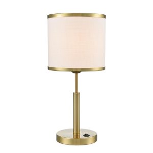 Franklite Polaris small aged brass table lamp with off-white textured fabric shade, on white background, lit.