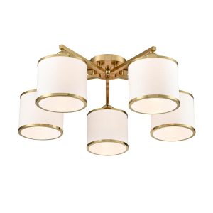 Franklite Sirius 5 light aged brass flush fitting ceiling light, on white background, lit.