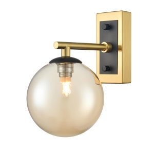 Franklite Stellar single wall light in matt black and aged brass with smooth amber glass, on white background.