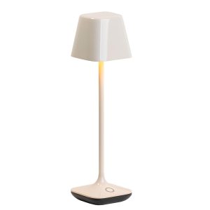 Franklite Wanderer rechargeable LED table lamp in a cream ceramic finish and rated IP65, on white background.