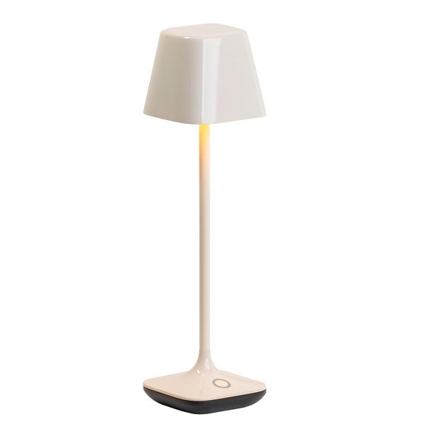 Franklite Wanderer rechargeable LED table lamp in a cream ceramic finish and rated IP65, on white background.