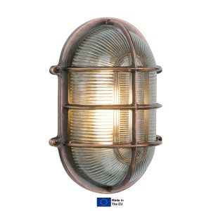 Admiral large oval solid brass outdoor bulkhead light in antique copper finish on white background lit