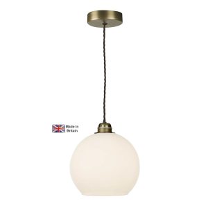Apollo 1 light pendant in solid antique brass with opal glass bowl shade on white background lit