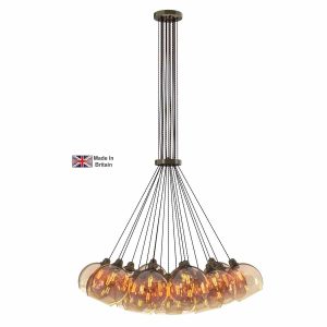 Apollo 19 light large cluster pendant in solid antique brass with amber glass shades on white background lit