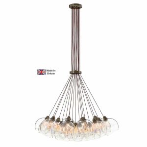 Apollo 19 light large cluster pendant in solid antique brass with clear glass shades on white background lit