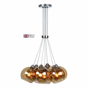 Apollo 7 light cluster pendant in polished chrome with amber glass shades on white background lit