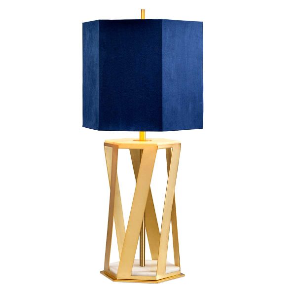 Apollo 1 light hexagonal table lamp in brushed brass finish with navy blue shade on white background, lit.