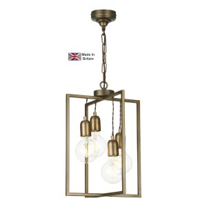 Chiswick 4 light ceiling pendant in antique brass finish on white background lit