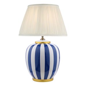 Circus blue and white ceramic table lamp with ivory shade on white background