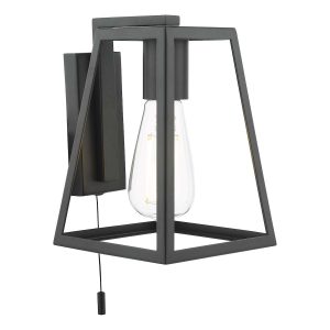 Claudia switched industrial style wall light in matt black on white background lit