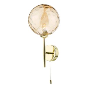 Cohen single switched wall light in polished gold with dimpled champagne glass on white background