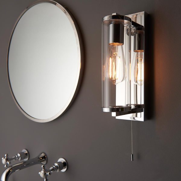 Cylinder switched bathroom wall light in chrome with clear glass shade main image