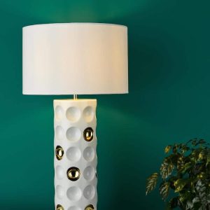 Dar Dimple 1 light white and gold ceramic table lamp with white shade on sideboard