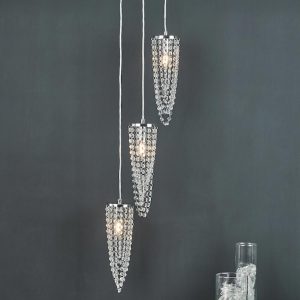 Dar Nuala 3 light cluster pendant in polished chrome with crystal shown over table