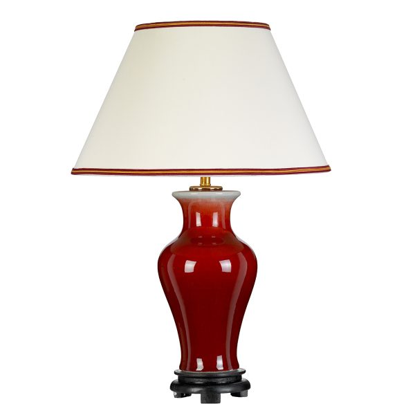 Majin oxblood ceramic vase table lamp with tall empire shade on white background.