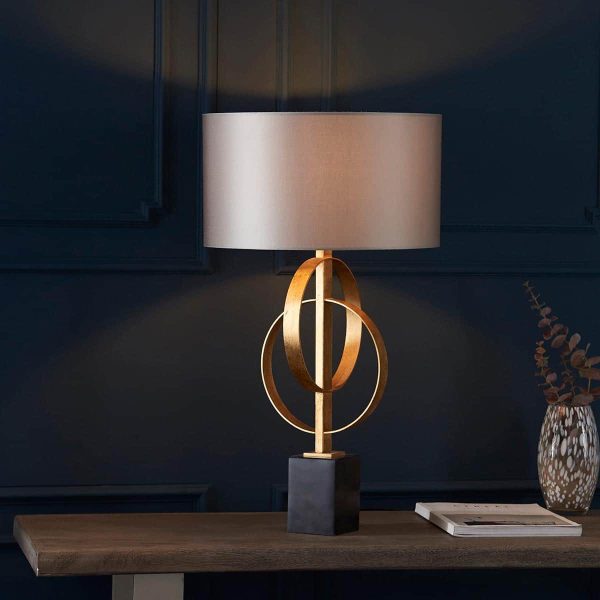 Double hoop gold leaf table lamp with black marble base and mink shade main image