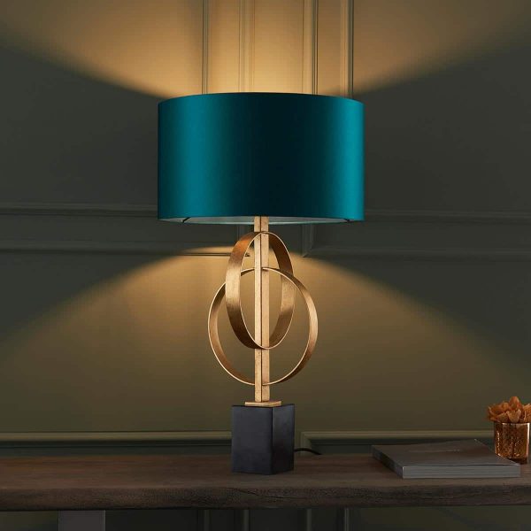 Double hoop gold leaf table lamp with black marble base and teal shade main image