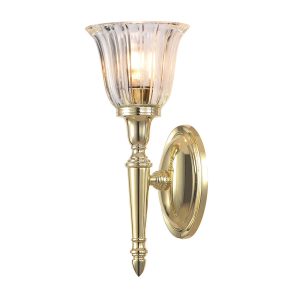 Dryden bathroom wall light in polished solid brass with ribbed fluted glass shade