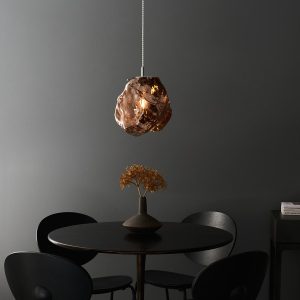 Endon Rock 1 light ceiling pendant with copper volcanic glass low over table