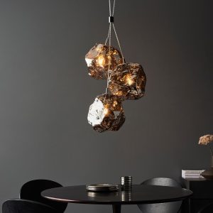 Endon Rock 3 light cluster pendant with chrome volcanic glass shades low over table