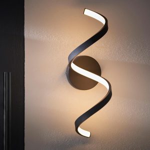 Astral twisted LED ribbon outdoor wall light in textured black insitu