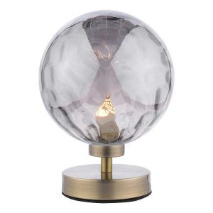 Esben touch table lamp in antique brass with smoked dimpled glass on white background