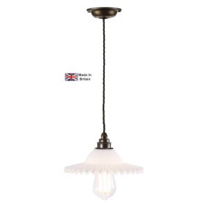 Finchley pendant light in solid antique brass with crimped edge glass shade on white background lit