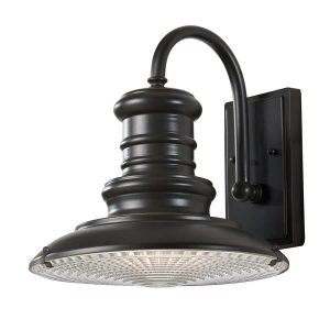 Feiss Redding Station medium outdoor wall lantern in restoration bronze with prismatic glass on white background.