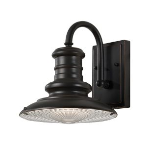 Feiss Redding Station small outdoor wall lantern in restoration bronze with prismatic glass on white background.