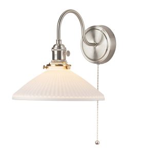 Hadano switched wall light in antique chrome with white ceramic coolie shade on white background lit