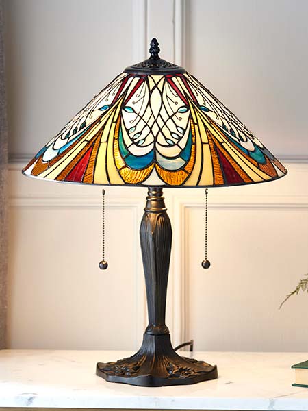 Hector 2 light Tiffany table lamp on shelf lit
