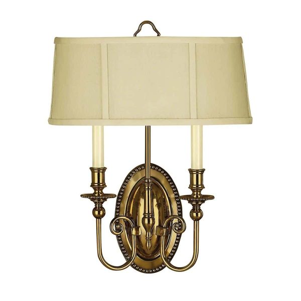 Hinkley Cambridge twin wall light in solid burnished brass with ivory half shade, main image on white background.