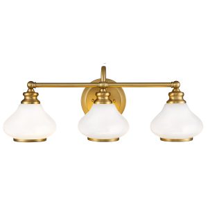 Hinkley Ainsley 3 light over bathroom mirror light in brushed brass finish on white background, lit.
