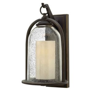 Hinkley Quincy 1 light medium outdoor wall lantern finished in oil rubbed bronze, shown on white background.
