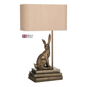 Hopper handmade 1 light right facing hare table lamp base only in bronze on white background lit