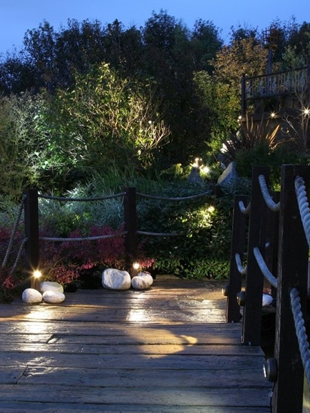 Garden decking showing a variety of lighting during darkness