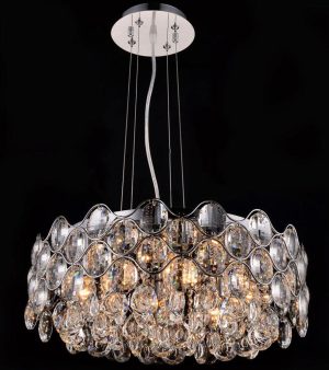 Impex Raina polished chrome 8 light circular crystal chandelier shown lit, on a black background.