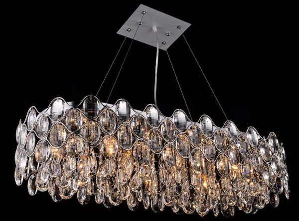 Impex Raina polished chrome 10 light oblong crystal chandelier, shown lit on a black background.