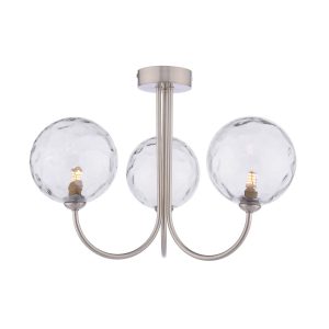 Jared 3 arm semi flush ceiling light in satin nickel with dimpled clear glass shades on white background lit