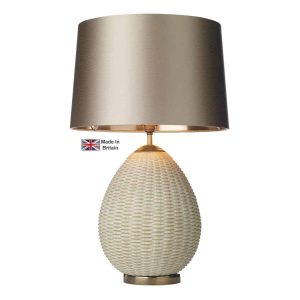 Lombok handmade table lamp base only in natural rattan look on white background lit