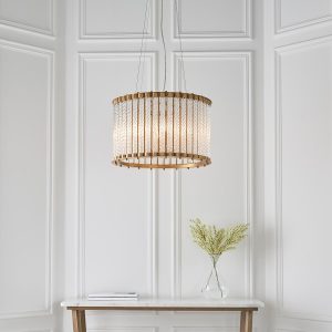 Contemporary 6 light twisted glass rods drum chandelier in matt gold roomset