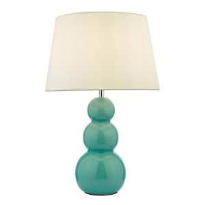 Mia ceramic table lamp with teal glaze and white shade on white background shown lit