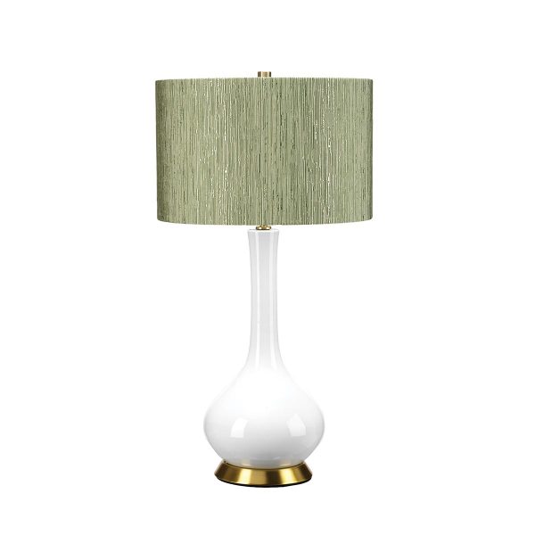 Milo white ceramic table lamp with aged brass metalwork and thyme shade on white background.