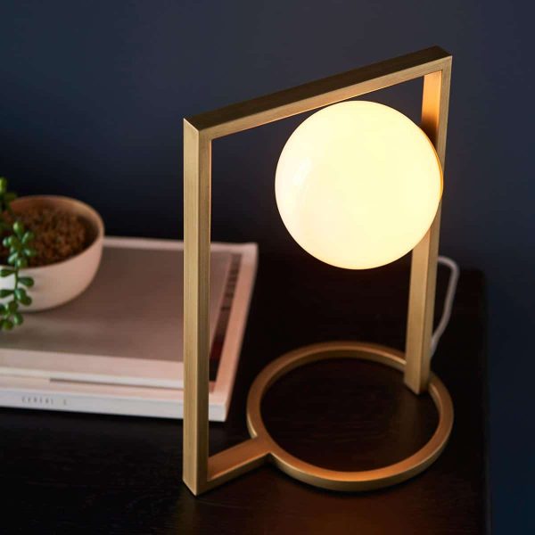 Geometric 1 light table lamp in brushed gold with opal glass shade main image