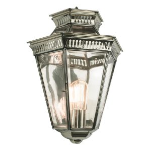 Edwardian style outdoor wall passage lantern in polished nickel on white background