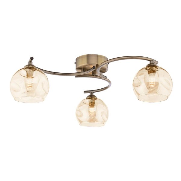 Nakita 3 arm flush ceiling light with champagne glass in antique brass on white background lit