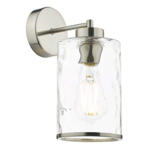 Olsen single switched wall light in satin chrome on white background lit