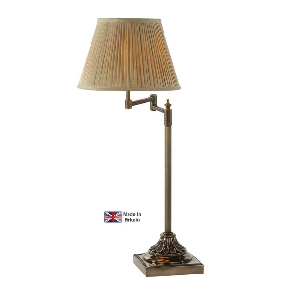 Pimlico swing arm table lamp solid antique brass on white background lit